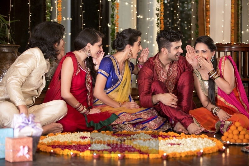couples gossiping at diwali party