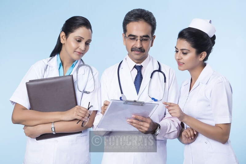 doctors checking reports 