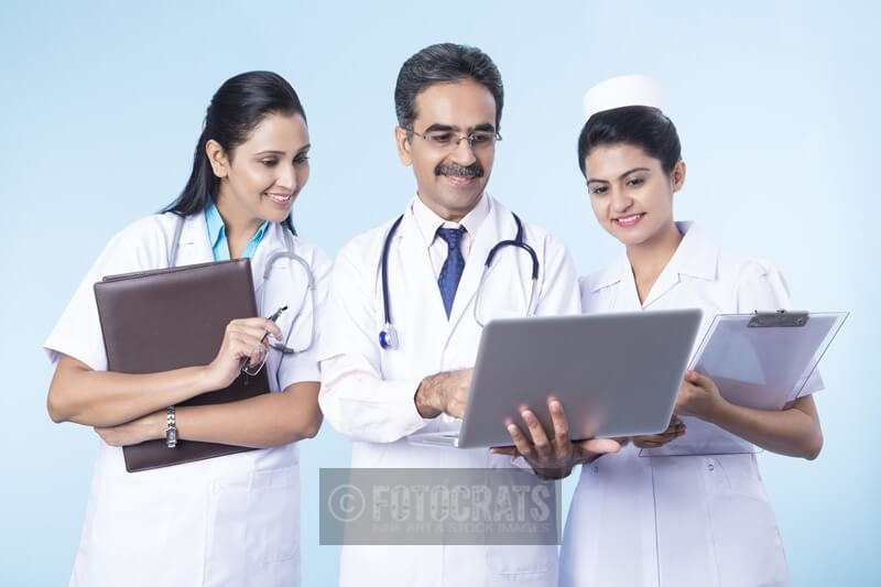 doctors working on laptop 