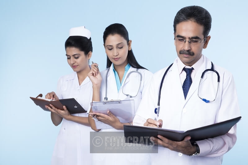 doctors working and checking reports