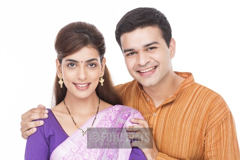hindu couple smiling and posing 