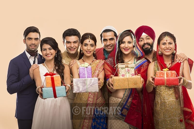 group of indian people posing with gifts