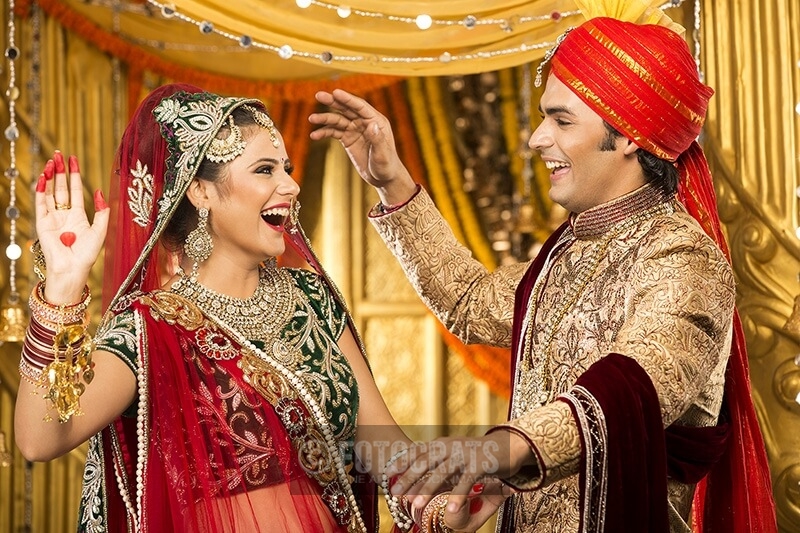 indian bride and groom dancing