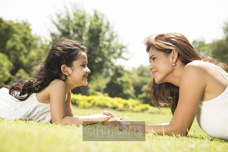 mother and daughter enjoying weekend in the park