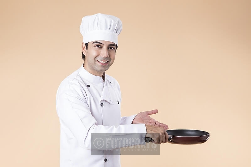 chef with frying pan