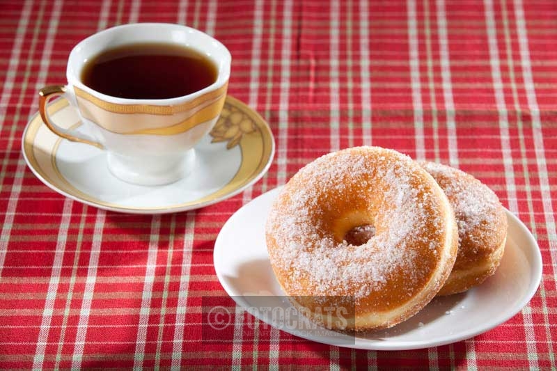 donuts served with hot beverage