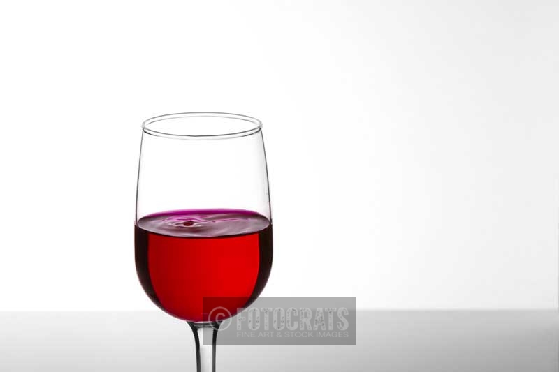a glass of red wine with copy space for advertising purposes