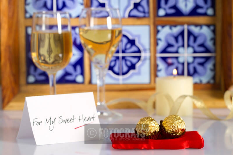 love message with chocolates and drinks