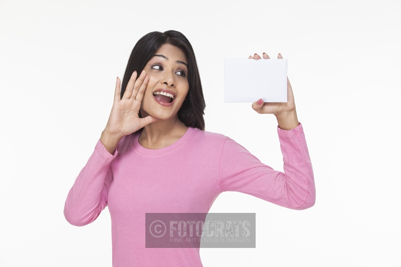 woman posing with a card