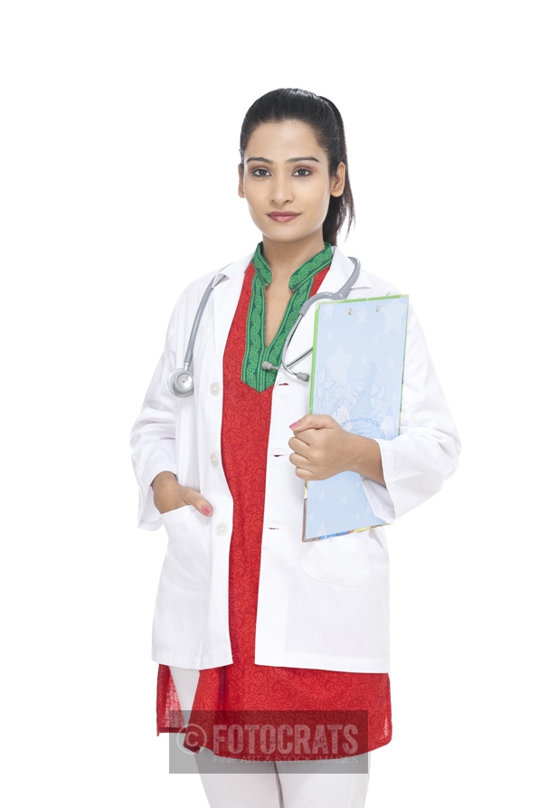 lady doctors standing in uniform with cardboard in hand