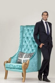 business man reclined on long back chair 