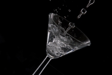 cocktail splash against a dark background