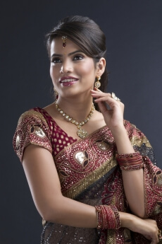 indian bride in traditional saree and make-up