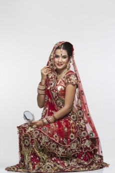 indian bride posing in bridal wear