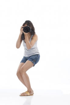 girl in action while clicking picture 