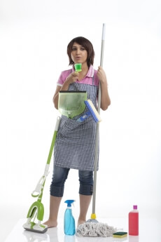 woman with all the household cleaning items