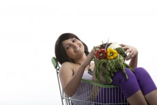 lady looking relaxed after buying vegetables