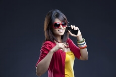 fashionable girl posing with mobile phone