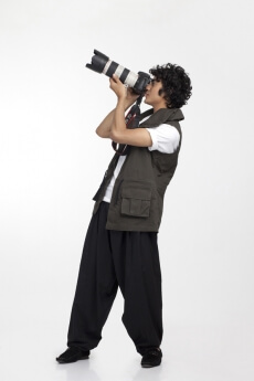 boy clicking pictures from his digital camera 
