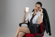stressed woman with a coffee mug
