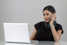 business woman talking while working