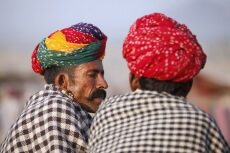 rural men wearing turban and talking 