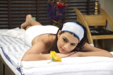 woman posing while relaxing at spa centre