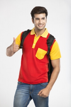 guy with backpack showing thumbs up 