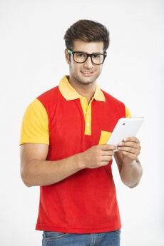 guy smiling and posing with tablet 