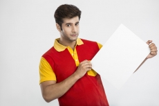 man holding white board