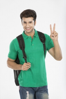 guy posing while showing victory sign
