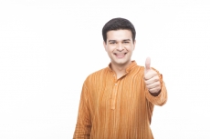 man in kurta showing thumbs up
