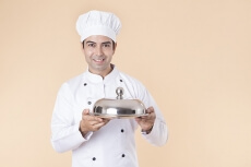 chef with serving tray