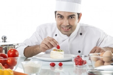 indian chef making dessert 
