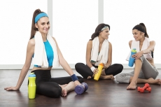 girls stretching in gym