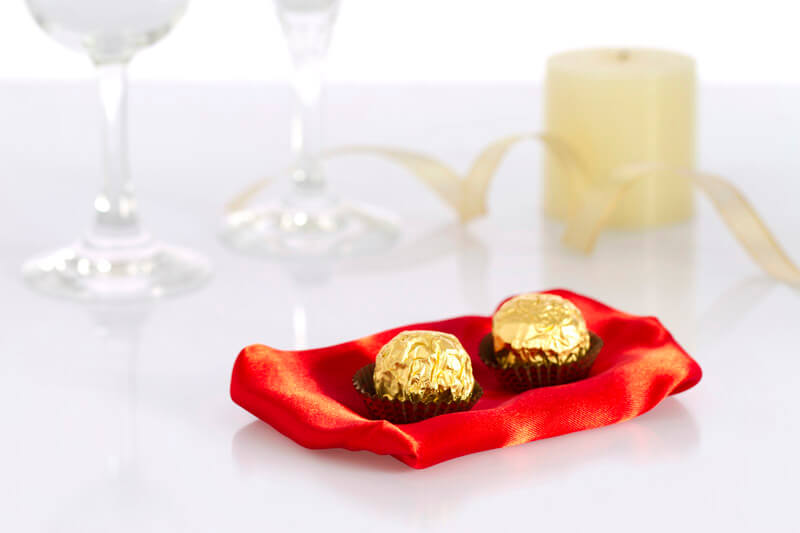 chocolate balls with almond in gold coloured foil